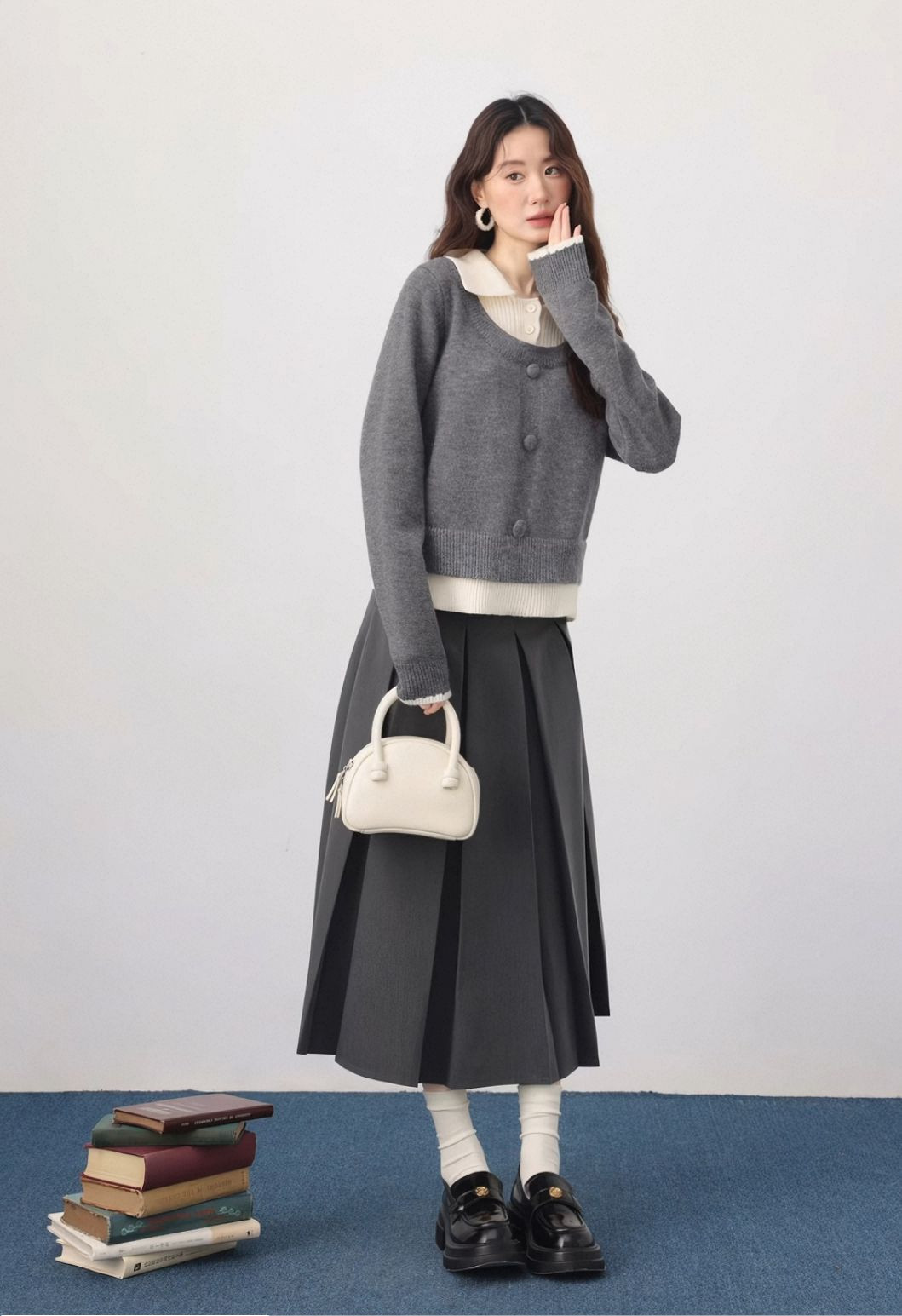 Wear a three-piece womens new design niche sweater for autumn and winter, and layer a skirt suit